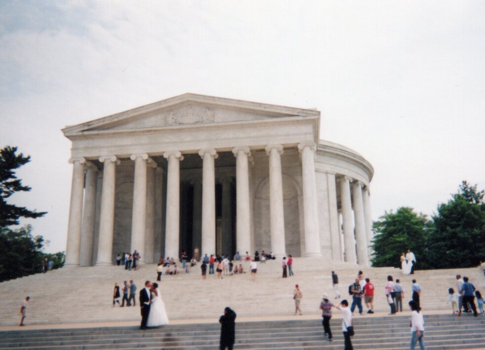 Photo of the Jefferson Memorial.  A group of scouts are walking up the stairs.