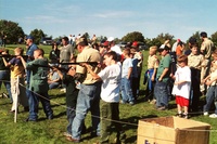 A group of scouts are shooting files.