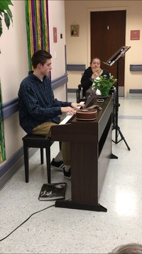 A student plays the piano.