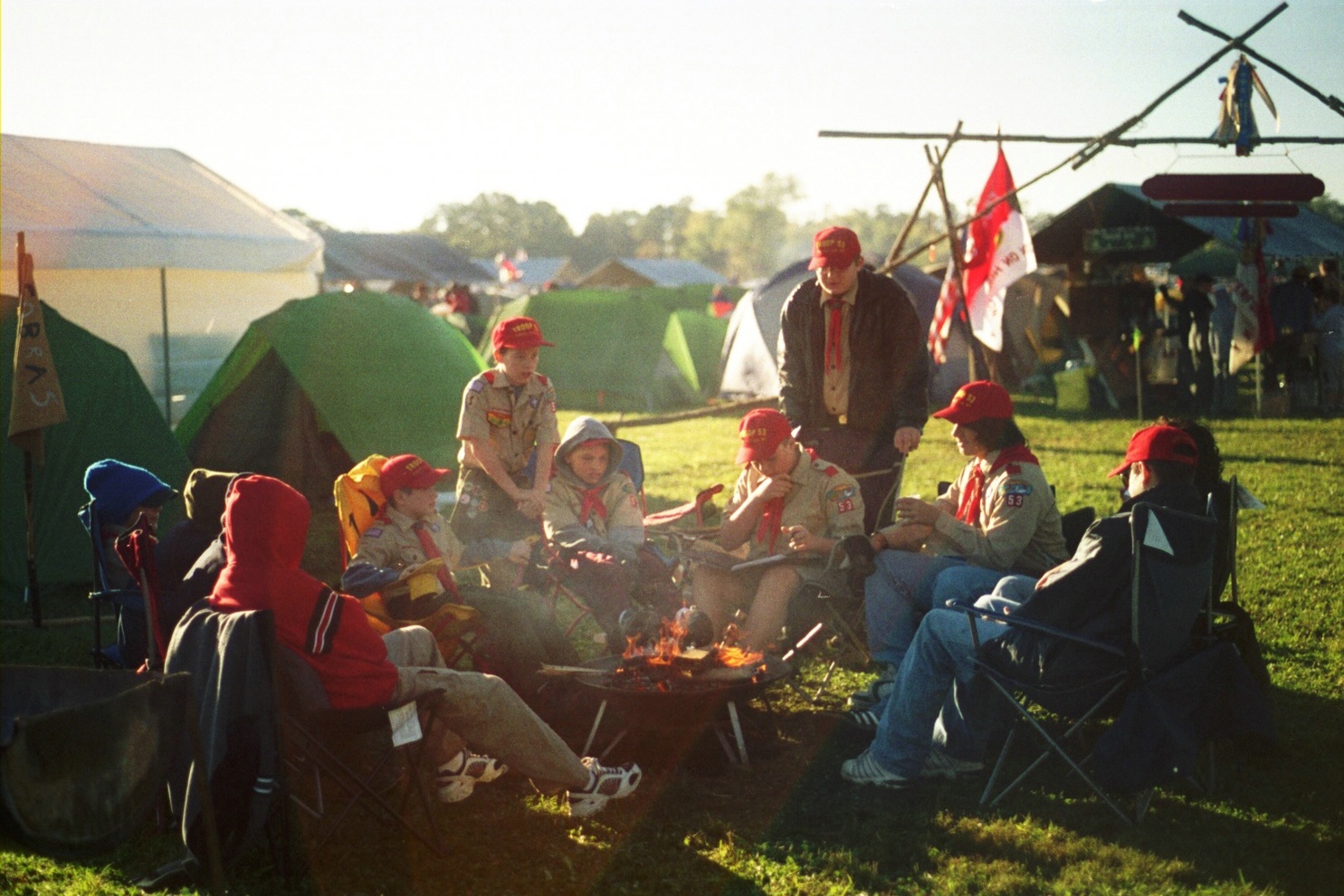 Scouts sitting around the camp fire.