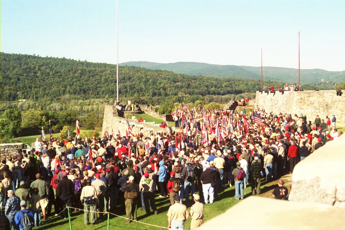 All of the scouts and adults from the campout standing around the flag pole on the fort.  There is no flag on the pole.