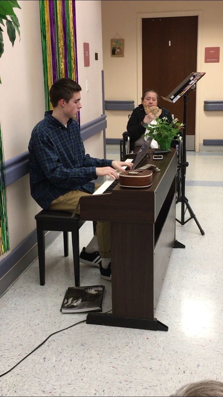 A student plays the piano.